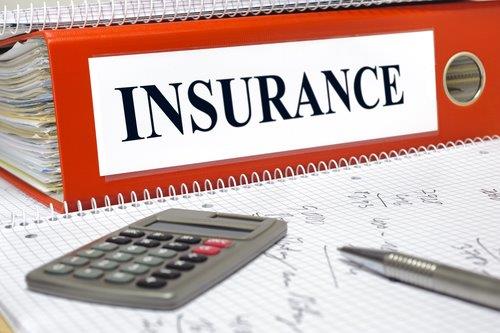 Insurance - word on a red binder-1